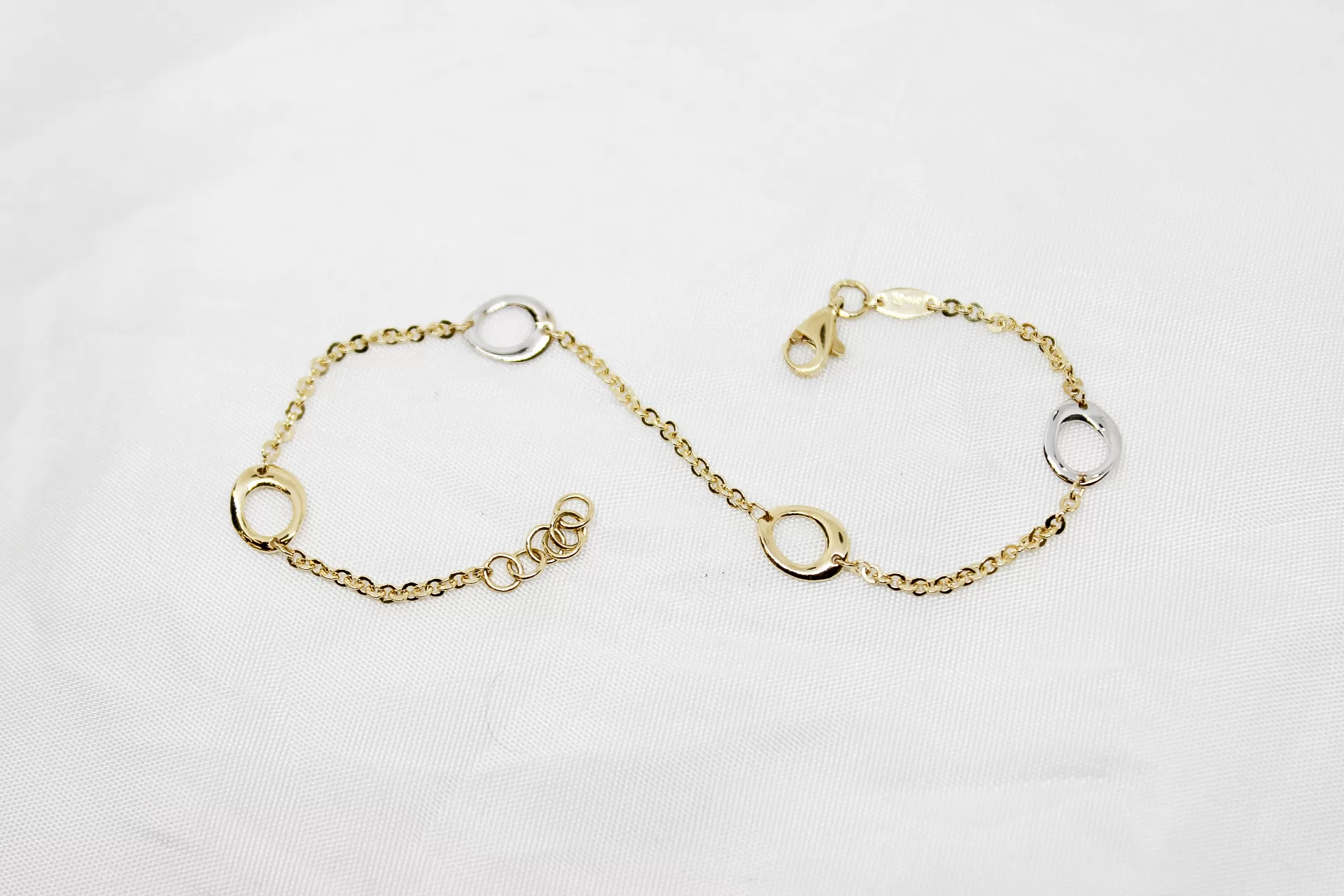 Pulseira em ouro bicolor com argolas