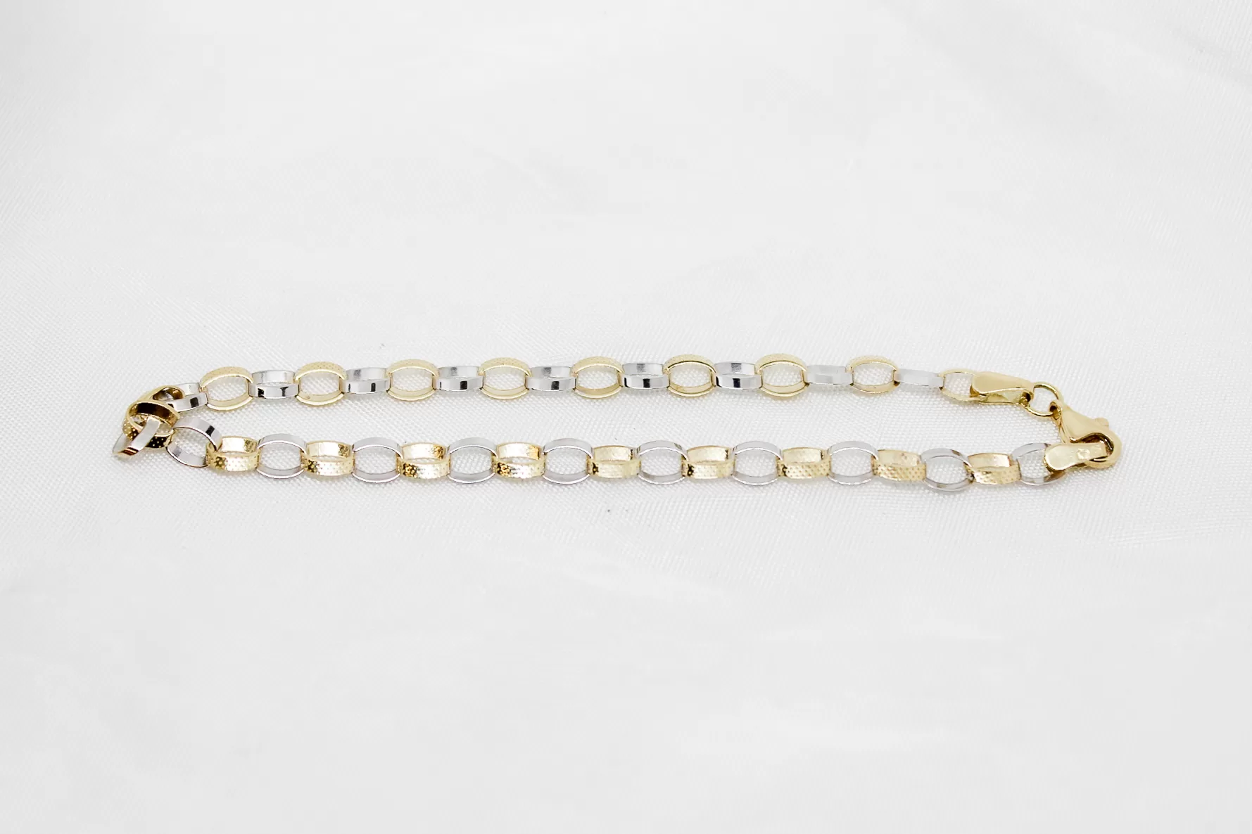 Pulseira em ouro bicolor argolas ovais