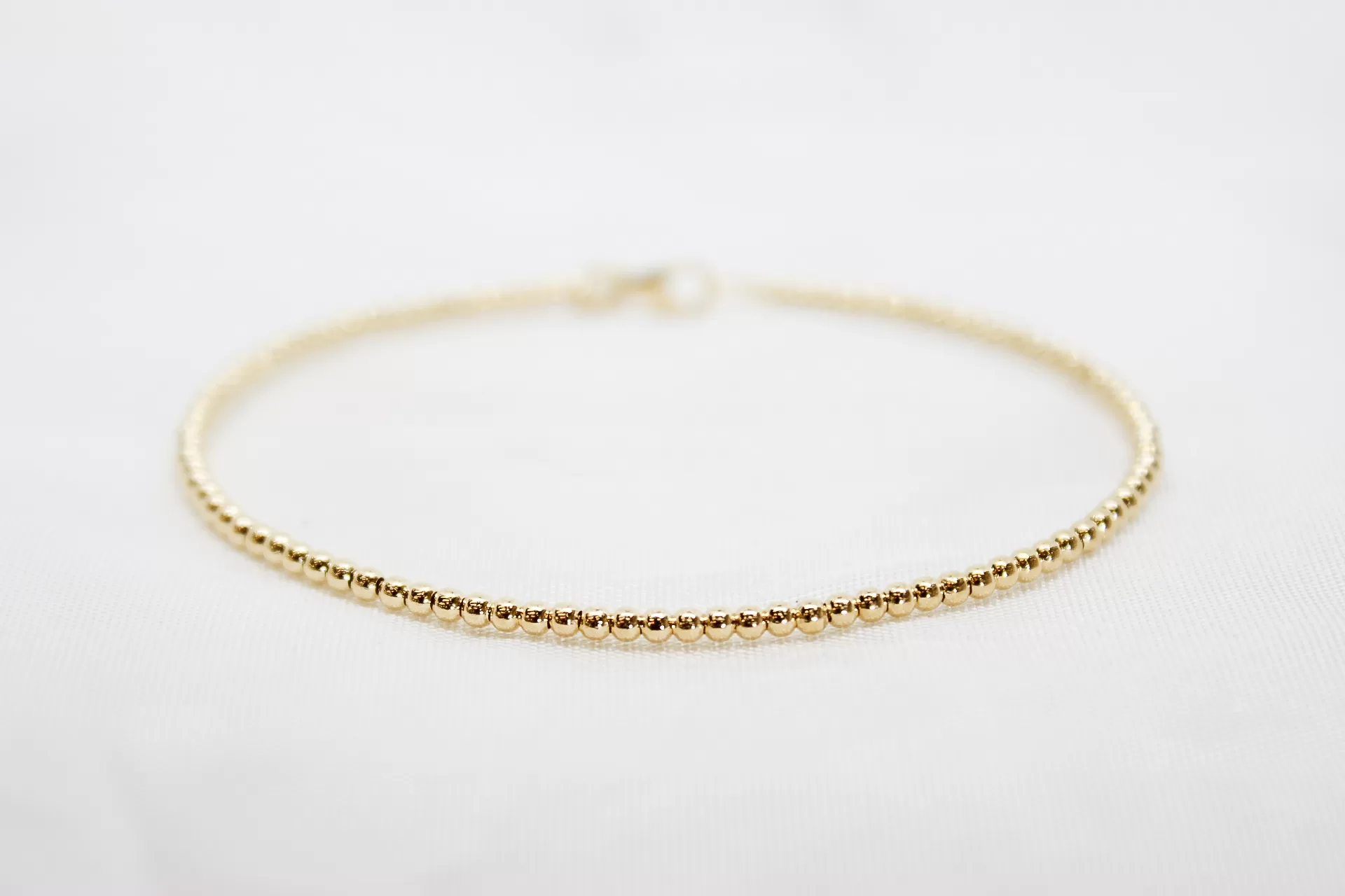 Pulseira em ouro escrava às bolinhas feitio riscadas